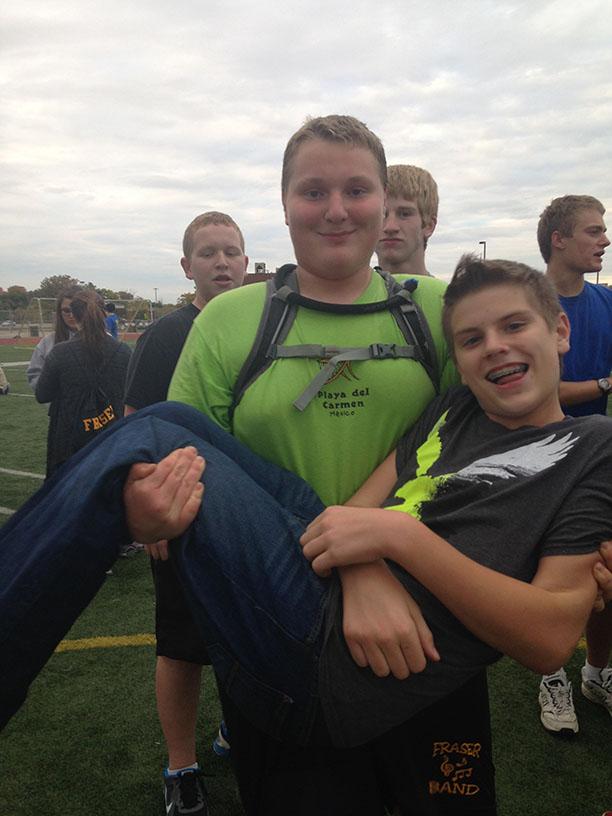 Reed Russell picks up Nick Jaworski at marching band practice.