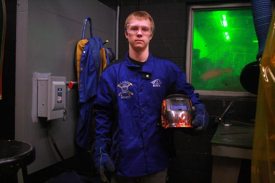Welding is serious business at Fraser High School. Anthony Paruszkiewicz has one serious helmet. 