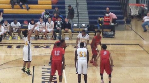 Marcus Rice (14) takes a free throw against Mt.Clemens.