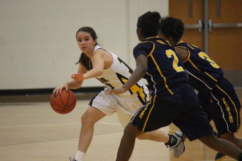 Senior guard Danielle Wernette (12) double teamed late in the 4th quarter.