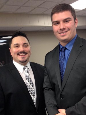 Mr. Brasure and Nick Rowan, Student of the Year, smile for the camera after Rowan accepted the award.