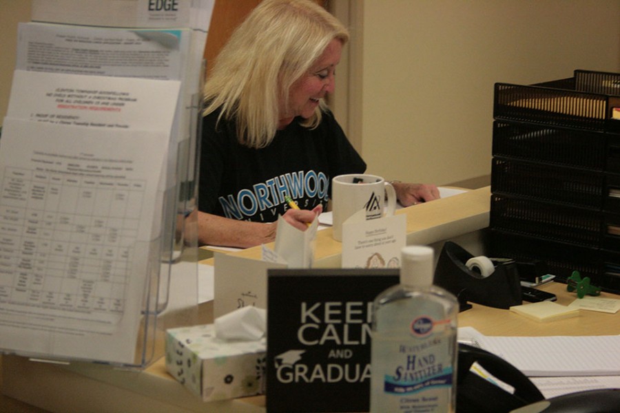 Counselor+Karen+Colby+looks+over+her+sign-up+list+to+see+which+students+she+was+meeting+with+that+day.
