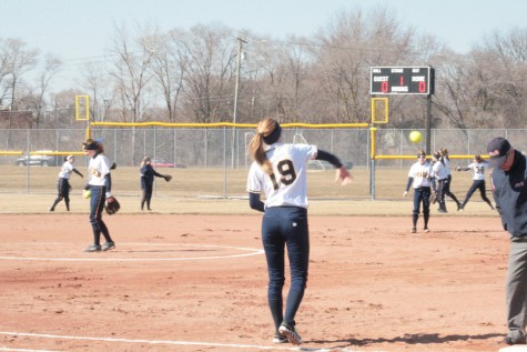 1st Basemen Heather Maracle warms up before the game against Chippewa Valley on March 24, 2015.