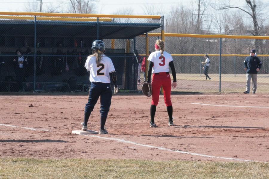 Frasers Chayse Anderer (#2) stands next to Chippewas Lauren Kilpatrick (#3) after reaching on a single.