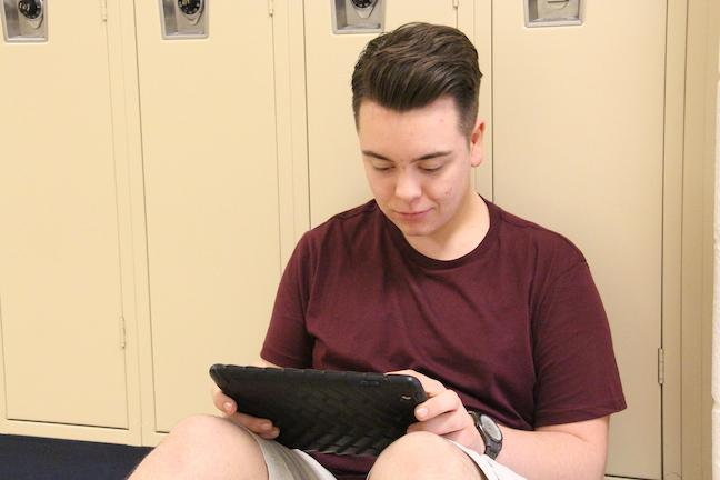 Sophomore Zach Dubay  works on a project. One of his passions is performing in the marching band.