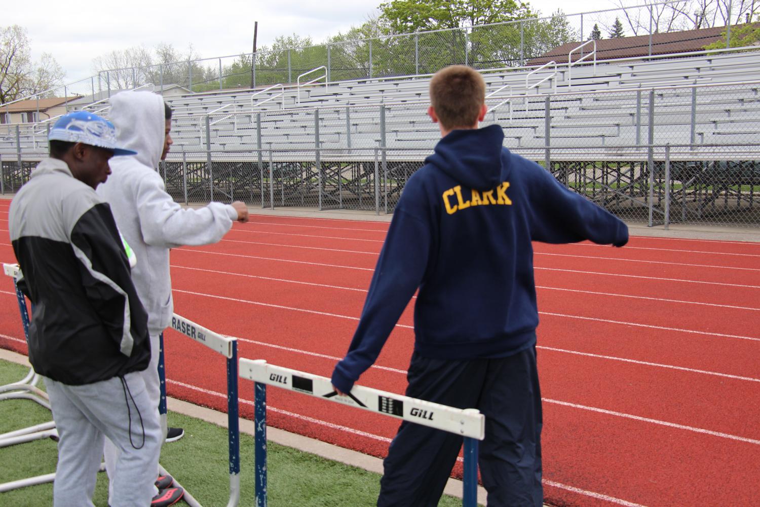 Setting up hurdles and not knowing where they go can be pretty stressful. So Ben Clark asks some, opponents and rival, Cousino runners for help. 