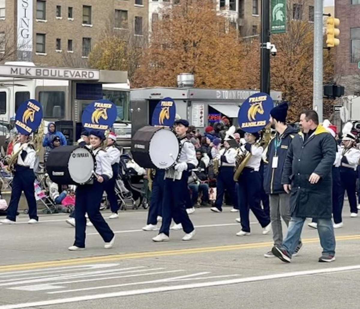 The Fraser High School Band walking in The Detroit Thanksgiving Day Parade.