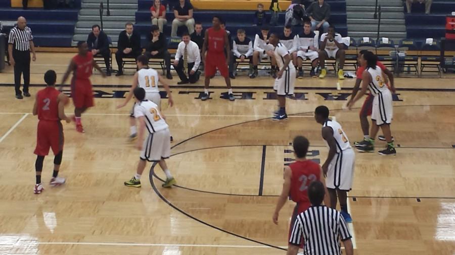 Mt. Clemens' David Gooley (4) is guarded by Fraser's Connor Piccolo (11).