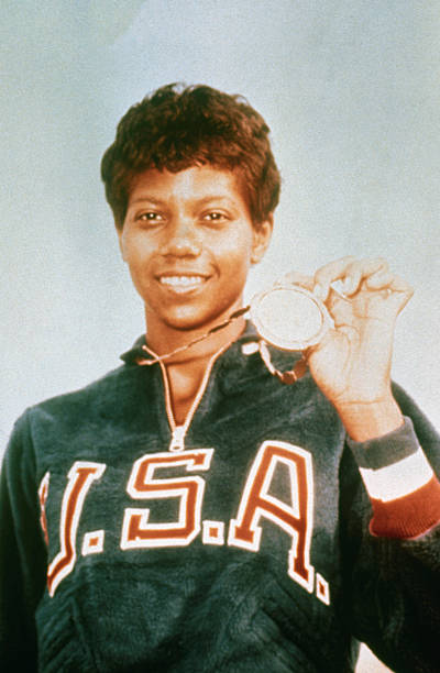 American sprinter Wilma Rudolph with her second gold medal, which she won for the Women's 200 metres at the Rome Olympics on 5th September 1960.